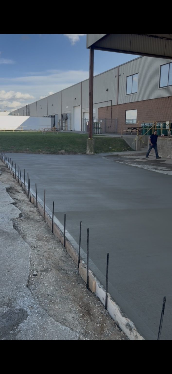 Industrial Asphalt Removal & Reinforced Concrete Pad project photo